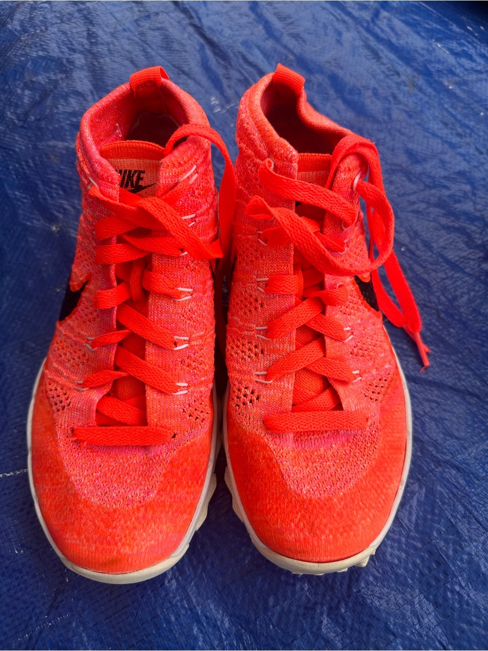 Nike Women’s Bright Orange-Red Flyknit Athletic Shoes